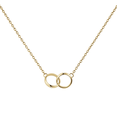 Delicate gold necklace featuring two interlocking circles with a polished finish and subtle crystal accents, suspended on a fine adjustable chain.