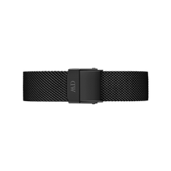 Matte black stainless steel mesh watch strap with a fold-over clasp, featuring a subtle woven texture and engraved detailing, designed for Daniel Wellington timepieces.