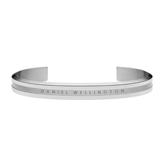 Polished silver Daniel Wellington Elan Bracelet featuring a minimalist cuff design with a brushed centre band and engraved logo.