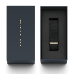 Cornwall Strap Rose Gold presented in a sleek Daniel Wellington gift box, featuring a black polyester NATO watch strap with a rose gold loop for a refined and modern look.