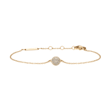 Delicate gold bracelet featuring a pavé-set crystal ball pendant with sparkling cubic zirconia stones on an adjustable gold-tone chain.