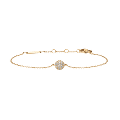 Delicate gold bracelet featuring a pavé-set crystal ball pendant with sparkling cubic zirconia stones on an adjustable gold-tone chain.