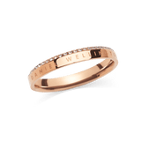 Slim rose gold ring with engraved Daniel Wellington branding and a single row of white cubic zirconia crystals set along the chamfered edge, offering a refined and elegant finish.