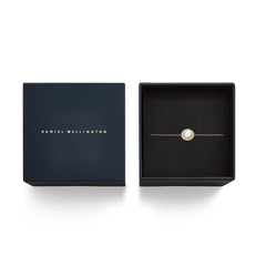 Audrey Bracelet Mother of Pearl Gold presented in a navy Daniel Wellington gift box, ideal for gifting elegant jewellery.