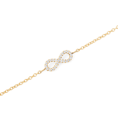 Close-up of the Mirelle Infinity Bracelet Gold, showcasing a delicate gold chain and a sparkling infinity symbol set with white cubic zirconia crystals.
