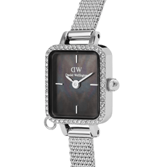 Close-up of Quadro Mini Crystal Zodiac Sterling watch with black mother of pearl dial, crystal bezel, and silver mesh strap.