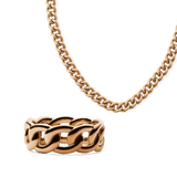 Chunky rose gold chain necklace and matching sculpted chain link ring, both featuring a bold, polished finish and contemporary design, displayed on a plain background.