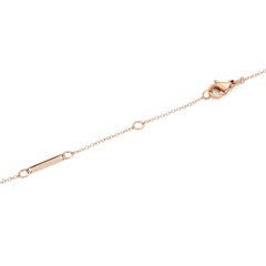 Close-up of the Crystal Zodiac Chain Necklace Rose Gold adjustable chain with lobster clasp and sizing rings for a custom fit.