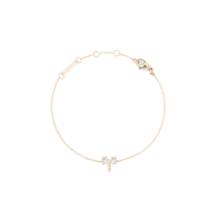 Slim gold chain bracelet with an Aries zodiac pendant embellished with sparkling crystals and an adjustable clasp.