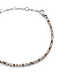 Close-up of the Classic Tennis Bracelet Honey Combo Silver, featuring a slim silver chain with individually set honey-toned and clear Preciosa crystals, finished with an adjustable lobster clasp.