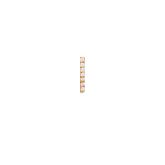 Slim gold bar stud earring featuring seven sparkling cubic zirconia crystals in a minimalist vertical design.