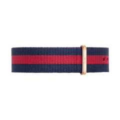 Navy and red striped nato watch strap with a polished rose gold buckle and keeper, crafted from durable polyester for Daniel Wellington timepieces.