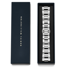Daniel Wellington Smartwatch Iconic Link Silver strap displayed in its signature navy presentation box, highlighting the polished and brushed stainless steel three-link design.