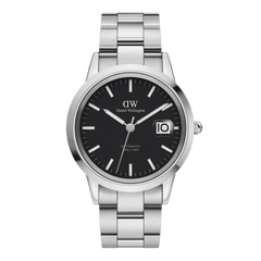 Men’s stainless steel automatic watch with a polished silver link bracelet, black dial, luminous hands, and magnified date display.