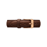Genuine dark brown leather watch strap with neat stitching and a rose gold buckle featuring the Daniel Wellington logo, offering a classic and versatile accessory for any timepiece.