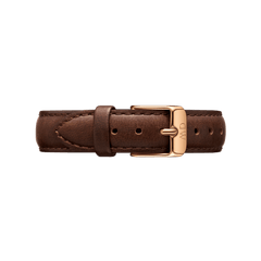 Genuine dark brown leather watch strap with neat stitching and a rose gold buckle featuring the Daniel Wellington logo, offering a classic and versatile accessory for any timepiece.