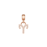 Aries zodiac charm in rose gold stainless steel, set with sparkling cubic zirconia crystals in a petite, elegant design.