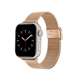 Apple Watch with a rose gold mesh stainless steel strap, featuring a fine weave and engraved clasp for a refined, modern look.