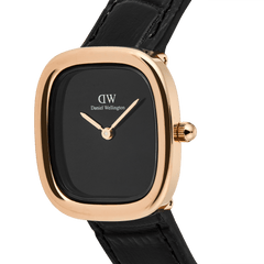 Close-up of the Margot Reading Onyx Ceramic Rose Gold watch, showcasing its square rose gold case, minimalist black onyx ceramic dial without indices, and a genuine black croc leather strap. The polished rose gold hands and sleek design highlight its refined, contemporary style.