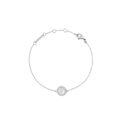 Delicate silver bracelet with a round mother of pearl charm and cubic zirconia accents, adjustable fine chain.