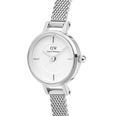Close-up of Petite Mini Sterling women’s silver watch with minimalist white dial and fine mesh stainless steel strap.