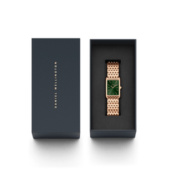 Bound 9-Link Emerald Sunray women’s watch with a rectangular rose gold case and emerald green dial, presented in an elegant Daniel Wellington gift box.