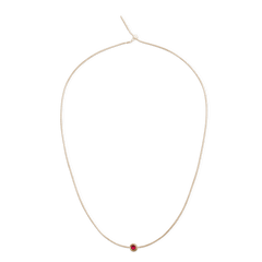 Delicate gold snake chain necklace featuring the January Charm Gold with a central deep red garnet-inspired crystal.