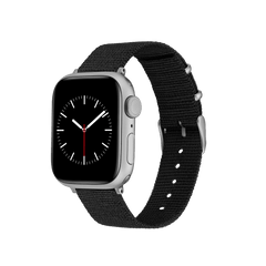 Silver Apple Watch with a black recycled polyester NATO strap and silver hardware, featuring a minimalist analogue watch face.