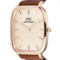 Close-up of Marlon St Mawes Linen Rose Gold watch with linen-textured dial, rose gold case, and brown leather strap.