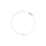 Elegant silver chain bracelet with an adjustable clasp, featuring a minimalist zodiac charm at the centre.