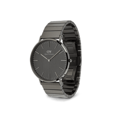 Classic Piano Link Graphite Unitone men’s watch with a brushed graphite dial, minimalist markers, and a geometric graphite stainless steel piano link strap shown at an angle.