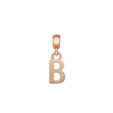 Rose gold letter B charm with a smooth, polished finish and minimalist design, crafted from stainless steel and featuring an anti-slip silicone lining for secure placement on bracelets or necklaces.
