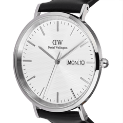Close-up of the Classic Day Display Sheffield Silver watch, showcasing its white textured dial, brushed stainless steel case, minimalist hour markers, and integrated day and date display.