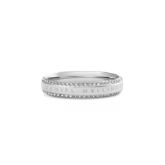 Classic Aura Duo Ring Silver featuring a slim band of polished stainless steel, two rows of white cubic zirconia crystals along the chamfered edge, and the Daniel Wellington logo engraved for a refined, modern finish.
