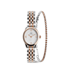 Ophelia Mini & Tennis Bracelet Apricot Silver Set featuring a silver and rose gold link watch with a round face and Roman numerals, paired with a slender tennis bracelet adorned with apricot-toned stones.