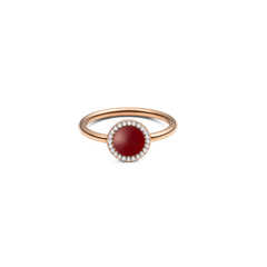 Rose gold ring with round red agate centre and halo of white cubic zirconia, elegant minimalist jewellery design.