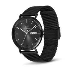 Daniel Wellington Classic Day Display Onyx men’s watch featuring a black textured dial with day and date display, polished black stainless steel case, and an adjustable black mesh strap for a sleek, modern finish.