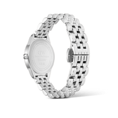 Ophelia Mini Ice Blue Silver watch showing engraved case back and polished stainless steel 5-link bracelet with butterfly clasp.