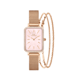 Rectangular rose gold women’s watch with a pink dial, crystal bezel, and matching mesh strap, paired with two coordinating rose gold bracelets featuring intricate detailing.