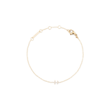 Delicate gold chain bracelet with an adjustable fit, featuring a crystal zodiac pendant and a lobster clasp fastening.