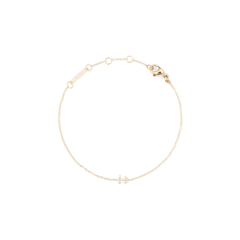 Delicate gold chain bracelet with an adjustable fit, featuring a crystal zodiac pendant and a lobster clasp fastening.