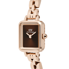 Close-up of the Quadro Mini Arch 3-link Amber Sunray Rose Gold watch, showcasing its rectangular rose gold case, minimalist amber sunray dial, and polished three-link bracelet.