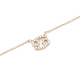 Gold chain necklace with a Cancer zodiac pendant encrusted with sparkling hand-set crystals.