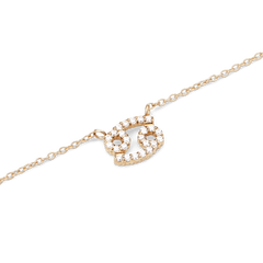Gold chain necklace with a Cancer zodiac pendant encrusted with sparkling hand-set crystals.