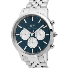 Close-up of the Daniel Wellington Iconic Chronograph Arch 5-Link Arctic Panda Silver watch, showcasing its blue enamel dial, silver sub-dials, luminous hands, and polished stainless steel bracelet.