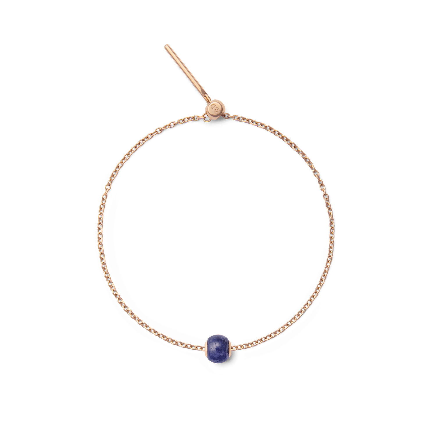 Rose gold bracelet featuring a single orb-shaped charm crafted from deep blue semi-precious stone, offering a minimalist and elegant accessory for everyday wear.
