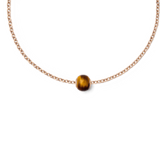 Tiger Eye Orb Rose Gold charm displayed on a delicate rose gold chain, featuring a polished tiger eye stone with natural golden-brown striations.