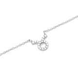 Delicate silver chain necklace featuring a Taurus zodiac pendant adorned with sparkling hand-set crystals.