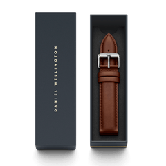 St Mawes XL Strap Silver presented in a sleek Daniel Wellington gift box, featuring light brown genuine leather with fine stitching and a polished silver buckle engraved with the brand’s monogram.