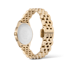 Rear view of the Daniel Wellington Ophelia Mini Emerald Gold watch, showing the engraved case back, gold beans link bracelet, and butterfly clasp in polished stainless steel.